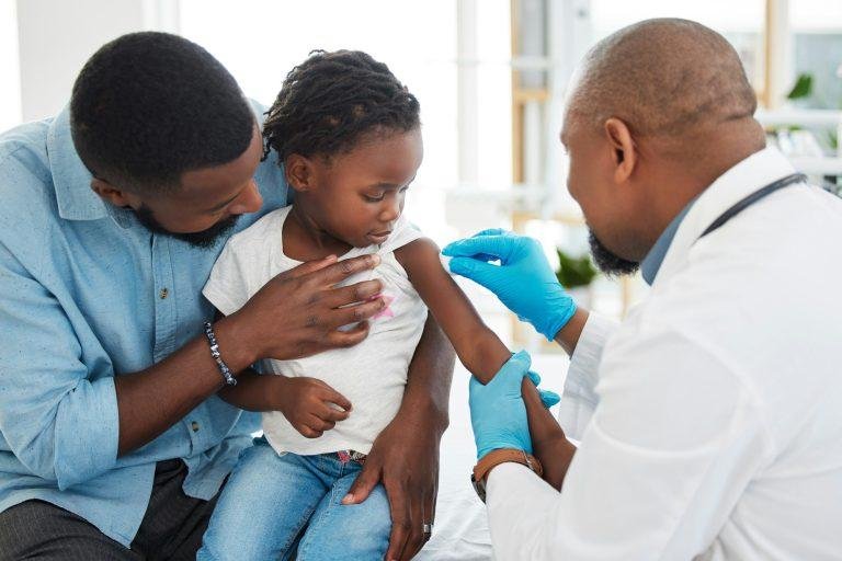 Covid, dengue and medical vaccine of a child with father and kid doctor and pediatrician. Healthcar